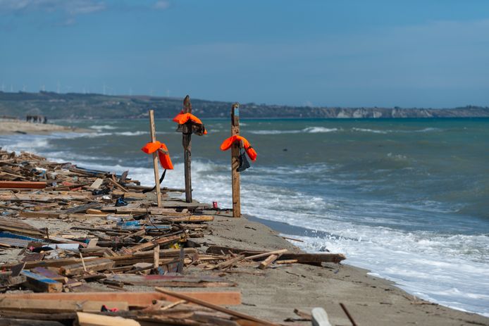 Image from February.  Lifejackets pass through a wooden wreck on a Crotone beach after a fishing boat full of migrants sank.  More than 70 people were killed.