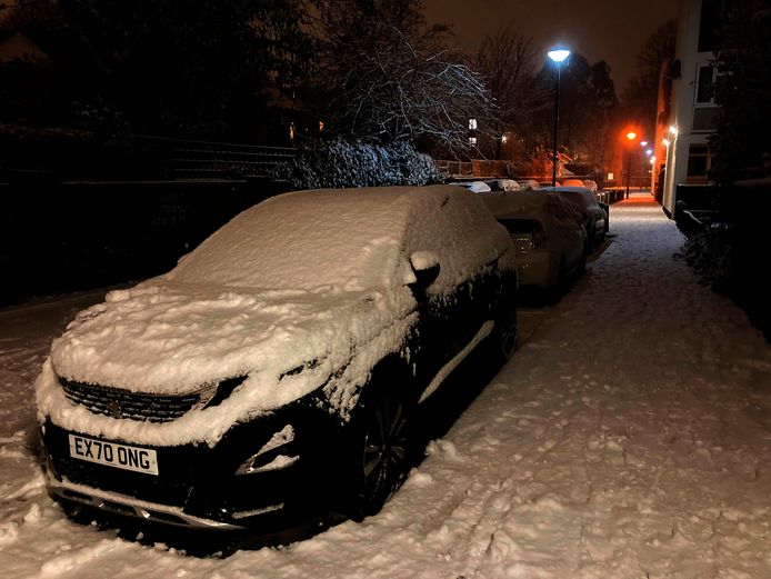 Cars covered in snow in Camden, North London.