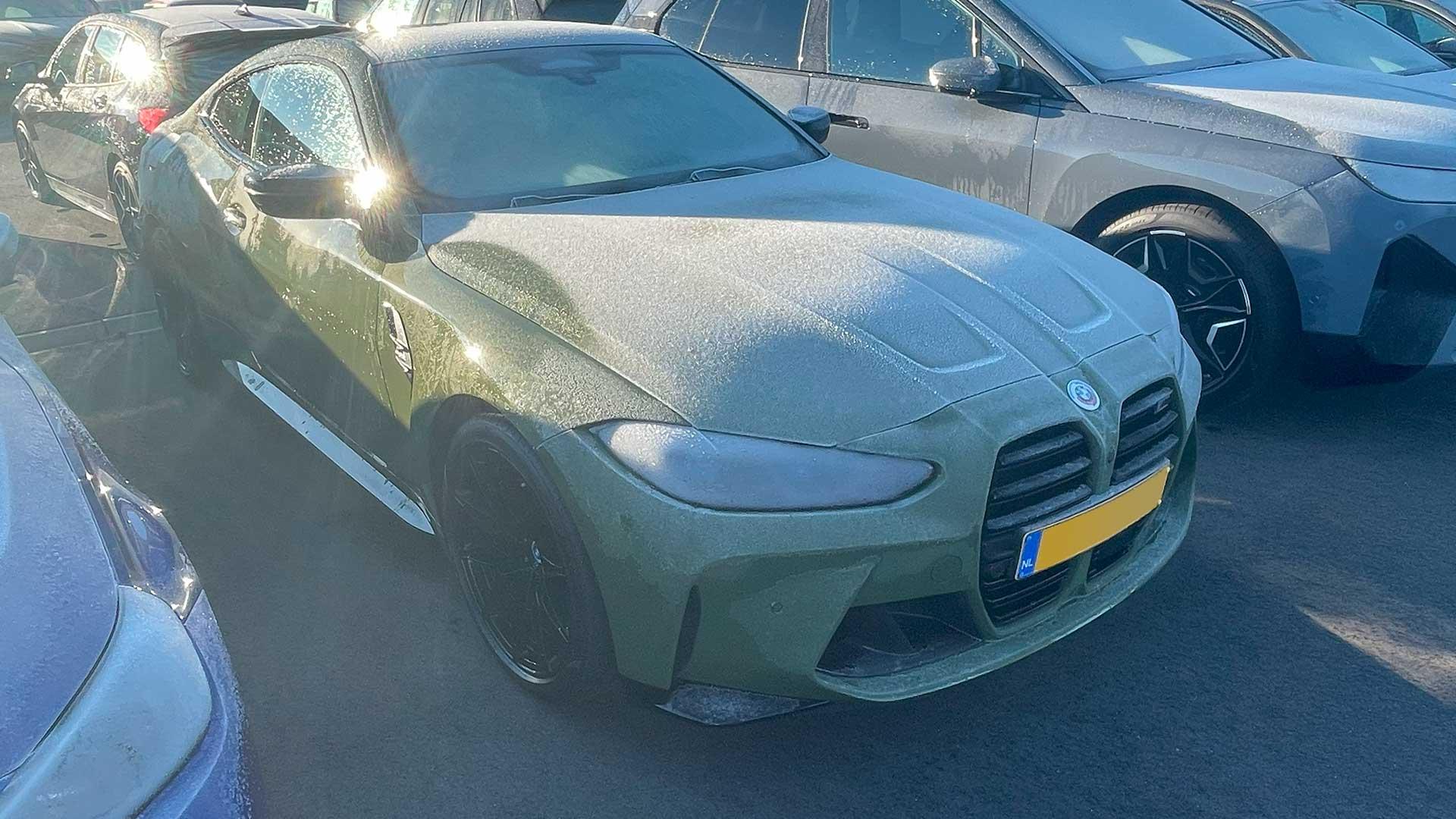 BMW M4 with ice on the windows (frost and scratches)