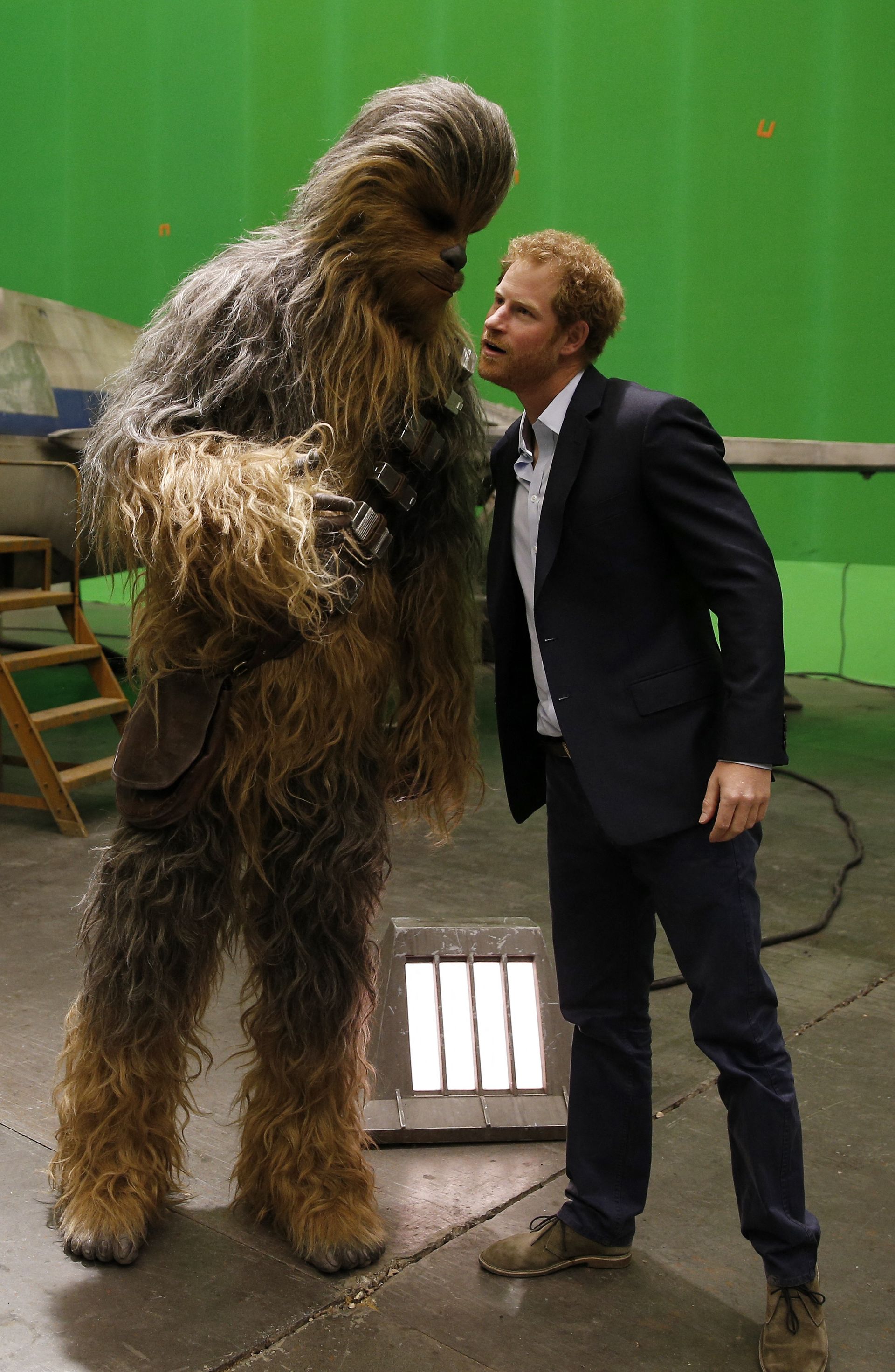 Prince Harry talks to Chewbacca